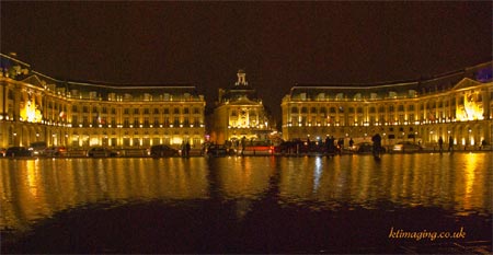 Bordeauz Palace reflects golden light into the water front