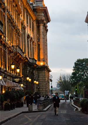 French street with lit building